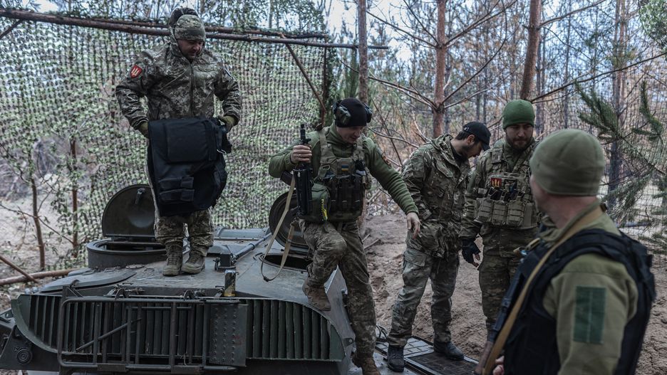 KREMINNA, UKRAINE - NOVEMBER 28: Ukrainian soldiers wait for orders beside a Soviet-era 2S1 Gvozdika self-propelled artillery system in the direction of Kreminna, Donetsk Oblast, Ukraine as Russia-Ukraine war continues on November 28, 2024. (Photo by Diego Herrera Carcedo/Anadolu via Getty Images)