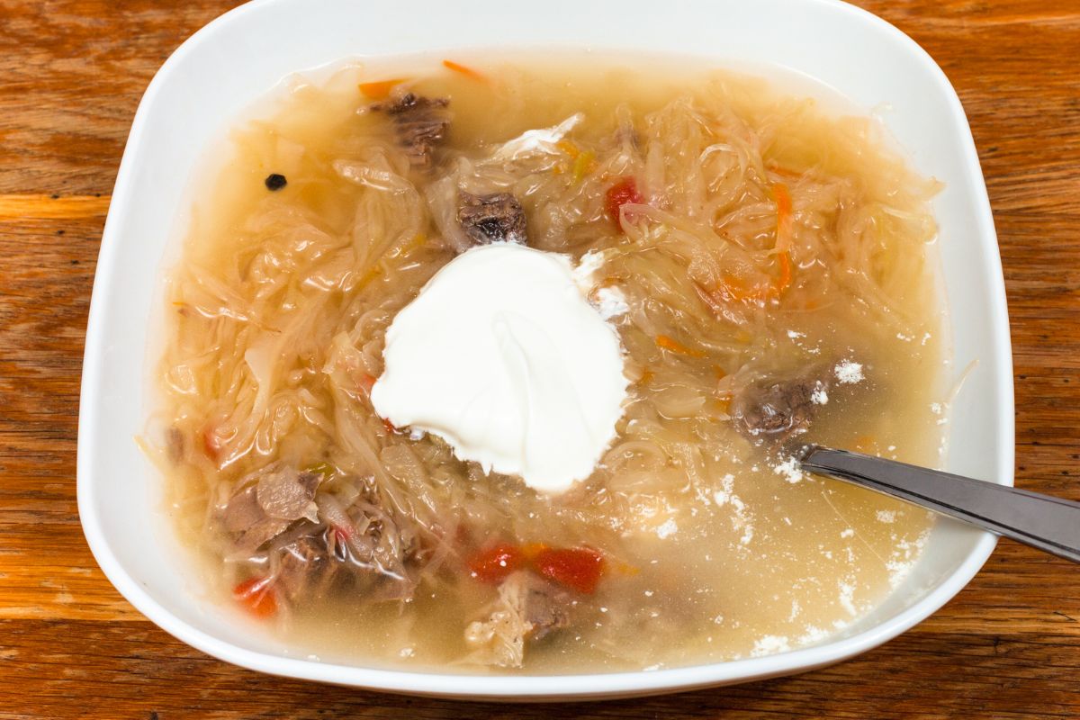 Cabbage soup can be served with a dollop of sour cream