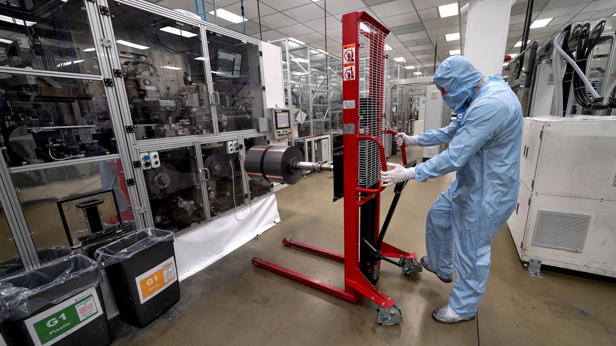 A worker moves components used in the manufacture of the battery for the Nissan Leaf at the Envision AESC UK Ltd battery plant based at Nissan in Sunderland. The Japanese car giant Nissan has announced that they are to build a new electric model and huge battery plant in the UK in a massive boost to the automotive industry. Picture date: Thursday July 1, 2021. More than 1,600 jobs will be created in Sunderland and an estimated 4,500 in supply companies under an investment of £1 billion. (Photo by Owen Humphreys/PA Images via Getty Images)