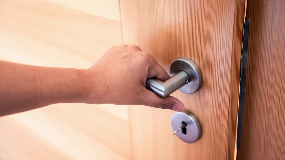 Woman Hand is Holding Door Knob While Opening a Door in Bedroom, Lock Security System and Access Safety of Doorway., Interior Design of Doorknob Entering to Accessibility Private Room
door, open, doorknob, entrance, handle, key, bedroom, lock, room, home, access, doorway, entry, exit, safety, security, gate, details, accessibility, enter, frosted, inside, privacy, residential, interior, knob, metallic, apartment, architecture, building, business, close, close-up, design, female, frame, hand, holding, house, human, office, person, private, steel, system, women, wooden, background, keyhole, metal