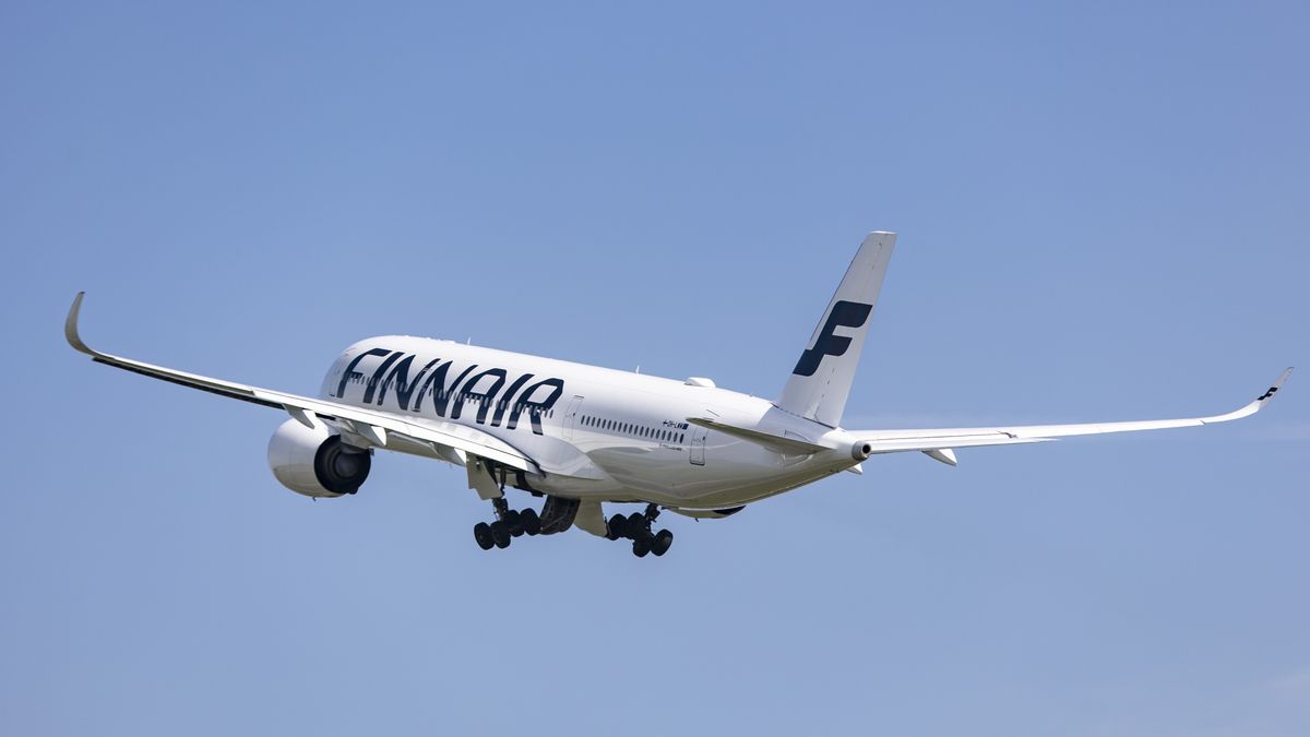Finnair Airbus A350-900 aircraft as seen during rotation, take off and fly phase as the plane is departing from Amsterdam Schiphol Airport AMS EHAM. The modern wide-body A350 passenger jet airplane has the registration OH-LWM. Finnair is the Finnish flag carrier and member of Oneworld aviation alliance group. The plane is flying to Helsinki, Finland. As the Covid-19 Coronavirus pandemic measures are suspended the aviation, travel and tourism industry are having increased demand for flights. Amsterdam, The Netherlands on May 4, 2022 (Photo by Nicolas Economou/NurPhoto via Getty Images)