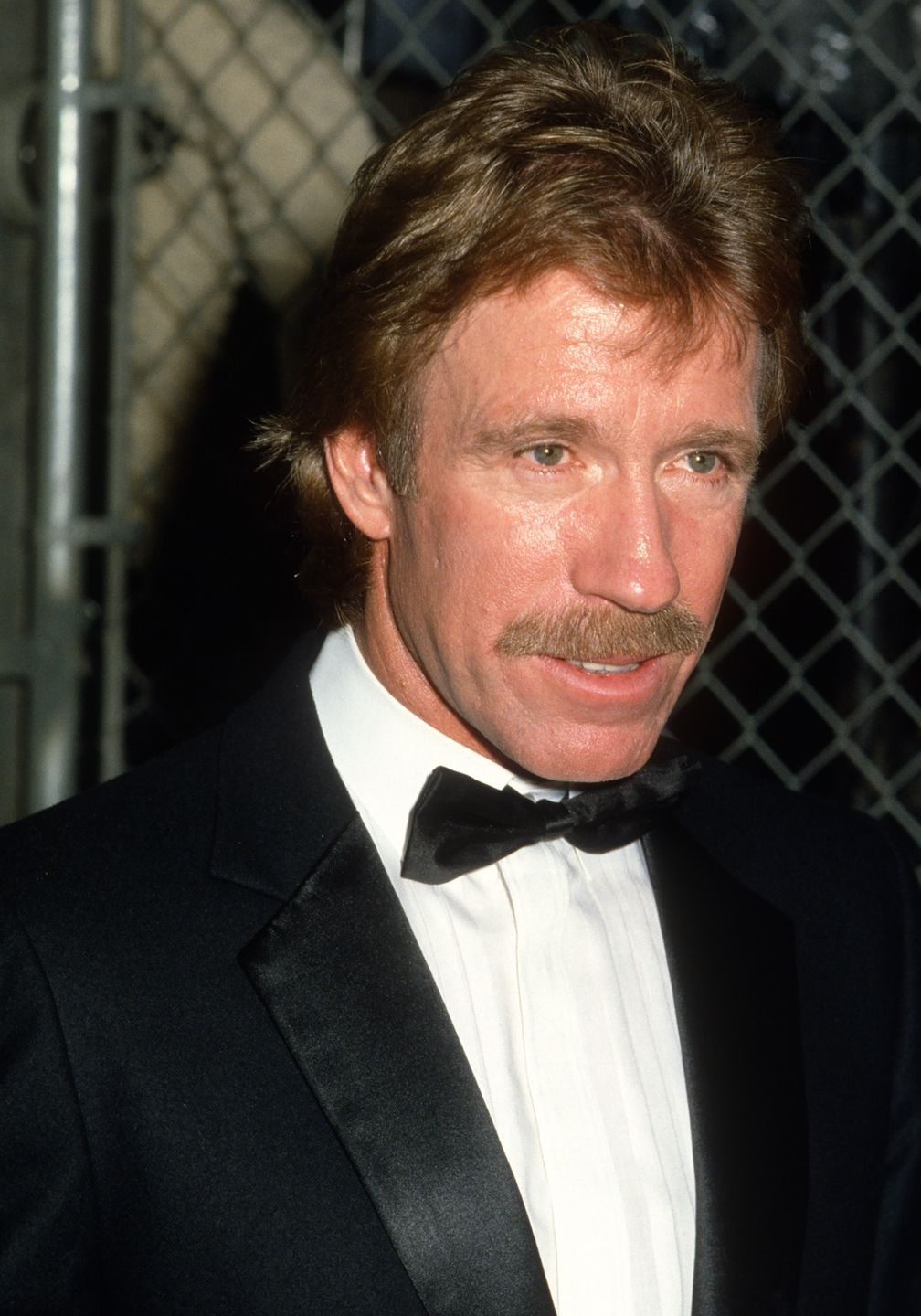 American actor Chuck Norris attends a premiere of 'The Naked Cage' at Cannon Films headquarters, Hollywood, California, February 22, 1986. (Photo by Jim Smeal/Ron Galella Collection via Getty Images)