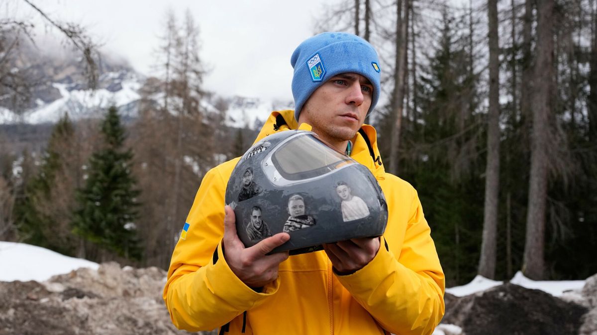TemporaryUkrainian skeleton athlete Vladyslav Heraskevych holds his crash helmet as he stands outside the sliding center at the 2026 Winter Olympics, in Cortina d'Ampezzo, Italy, Thursday, Feb. 12, 2026. (AP Photo/Alessandra Tarantino)Alessandra Tarantino