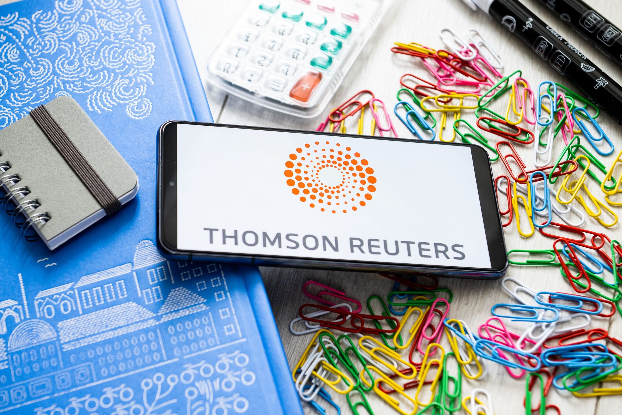 In this photo illustration a Thomson Reuters logo seenGDANSK, POLAND - 2023/03/07: In this photo illustration a Thomson Reuters logo seen displayed on a smartphone. (Photo Illustration by Mateusz Slodkowski/SOPA Images/LightRocket via Getty Images)SOPA Imagesthomson reuters, smartphone, phone, device