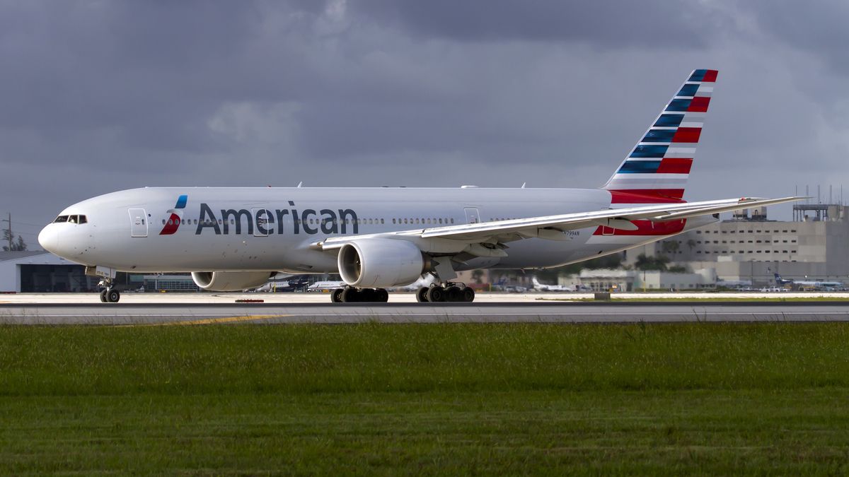 MIAMI, UNITED STATES - 2016/06/22: An American Airlines Boeing 777-300ER is seen on the runway at Miami International Airport. Miami serves as American Airlines' third-largest hub and its main gateway to Latin America and the Caribbean. (Photo by Fabrizio Gandolfo/SOPA Images/LightRocket via Getty Images)