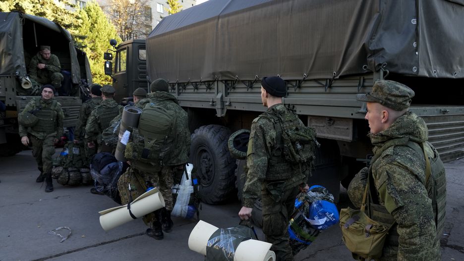 MOSCOW, RUSSIA - OCTOBER 10: Russian citizens drafted during the partial mobilization are seen being dispatched to combat coordination areas after a military call-up for the Russia-Ukraine war in Moscow, Russia on October 10, 2022. (Photo by Stringer/Anadolu Agency via Getty Images)
