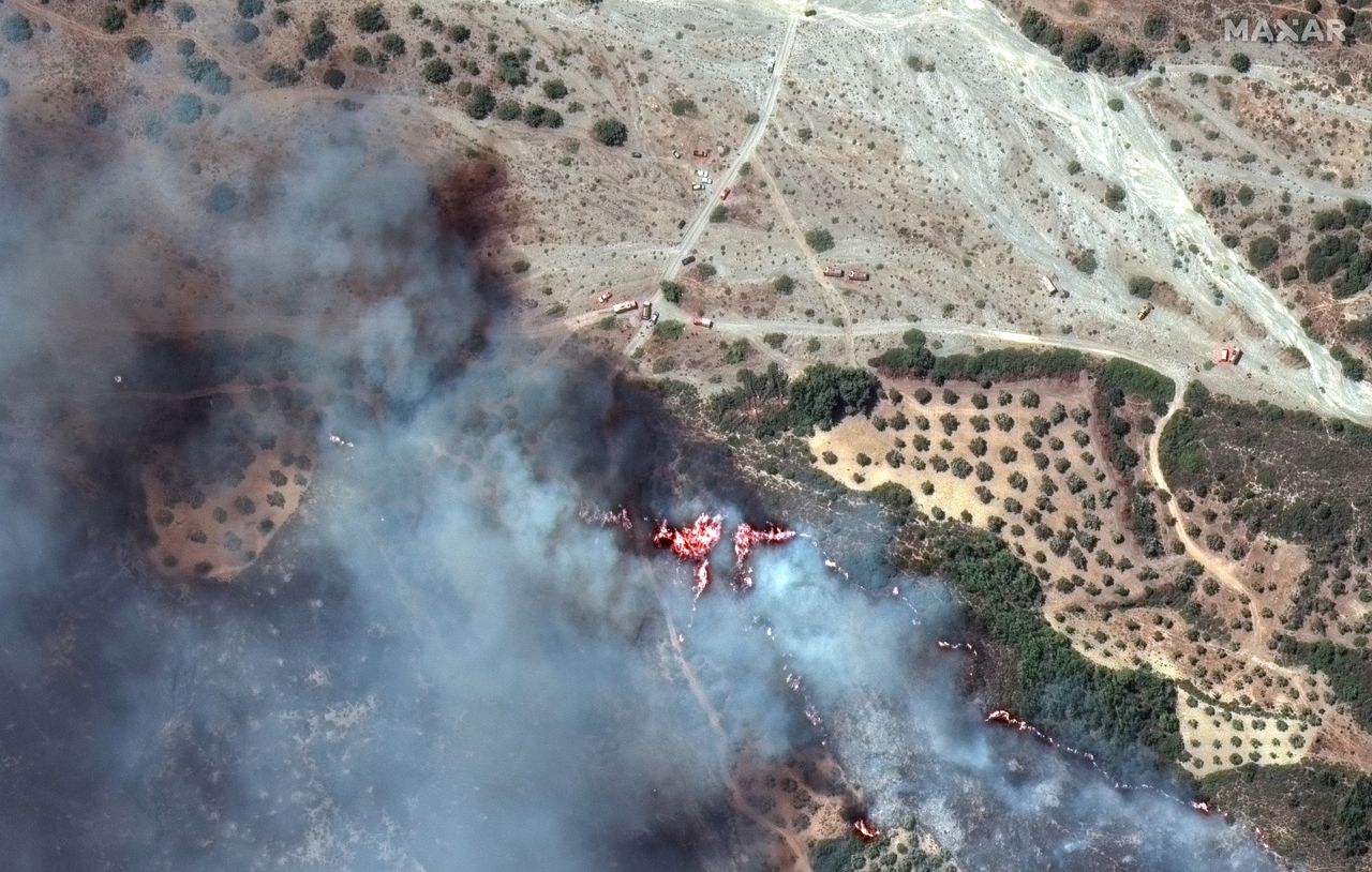 RHODES WIDFIRE, GREECE -- JULY 24, 2023:  09 Maxar closeup satellite imagery of fire fighting crews near the fire line in Rhodes, Greece.  Please use: Satellite image (c) 2024 Maxar Technologies.