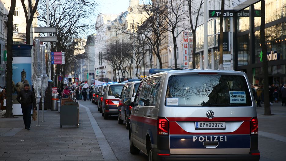 VIENNA, AUSTRIA - JANUARY 27: Police take security measures as people, holding banners and Palestinian flags, stage a demonstration in support of Palestinians, and demanding ceasefire at Mariahilfer Strasse in Vienna, Austria on January 27, 2024. Banners reading 'No to genocide', 'Immediate ceasefire' and 'Freedom for Palestine' were carried in the march organized to react to Israel's continuous attacks on Gaza, which has been going on for about 4 months. (Photo by Askin Kiyagan/Anadolu via Getty Images)