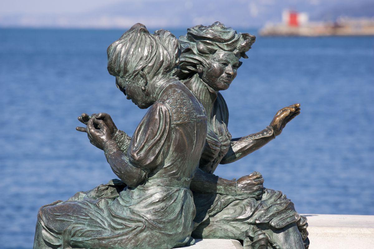 Monument To The Bersaglieri. Sculpture of Woman Sewing. Riva Dei Caduti. Unità D' Italia Square. Trieste. Friuli Venezia Giulia. Italy. Europe. (Photo by: Giulio Andreini/UCG/Universal Images Group via Getty Images)