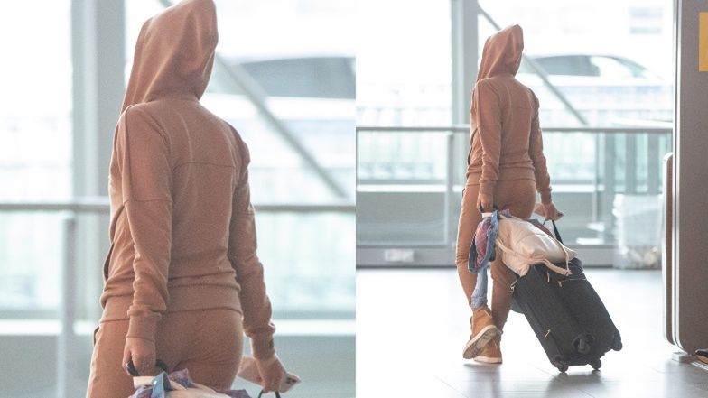 Sandra Kubicka w kapturze i okularach przeciwsłonecznych ukrywa się przed fanami (?) na lotnisku