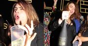 Cara Delevingne baluje w klubie, wymachując na parkiecie butelką autorskiego prosecco. "Wyglądała na bardzo pijaną" (ZDJĘCIA)