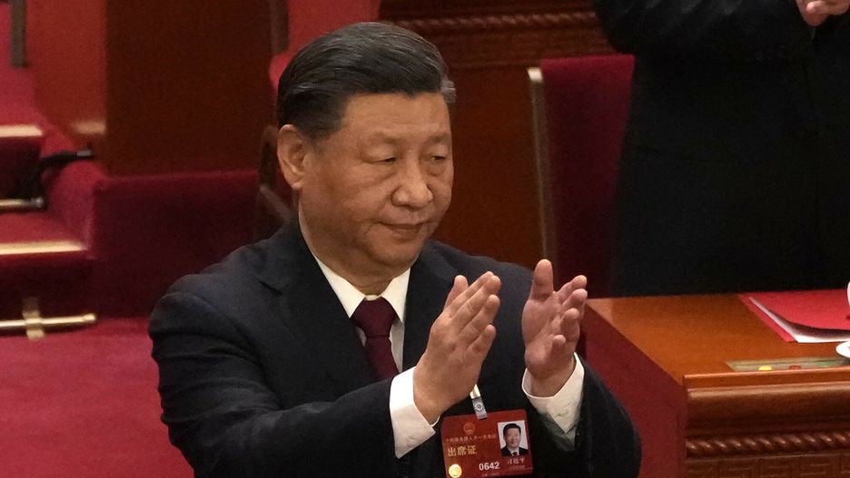 arch54
Chinese President Xi Jinping applauds at the closing ceremony for China's National People's Congress (NPC) at the Great Hall of the People in Beijing, Monday, March 13, 2023. (AP Photo/Andy Wong)
Andy Wong