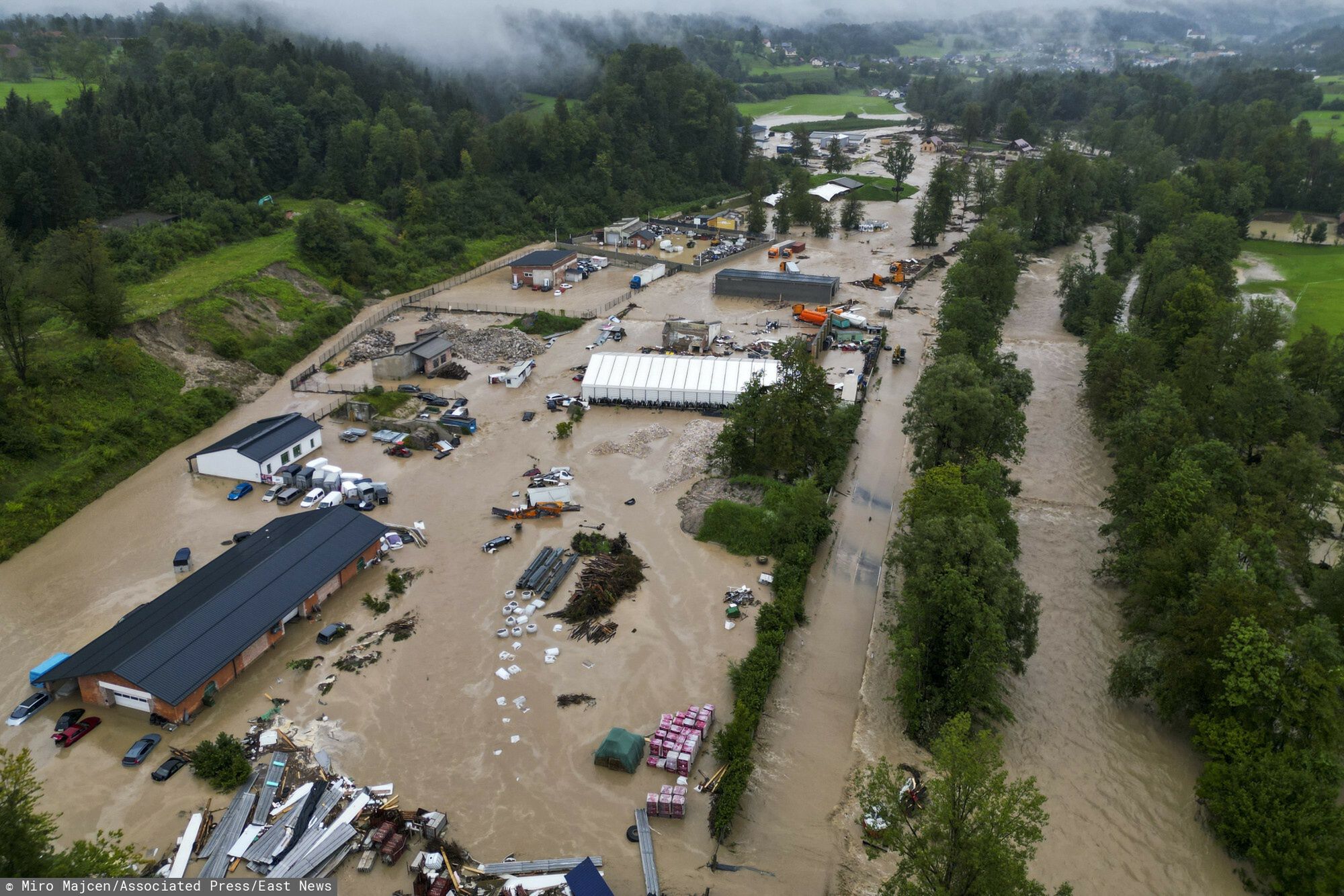 TemporaryA view of flooded business district near town of Kamnik, Slovenia, Friday, Aug. 4, 2023. Slovenia has faced the worst-ever natural disaster in its history, Prime Minister Robert Golob said Saturday, after devastating floods caused damage estimated at half a billion euros ($550 million). Devastating floods on Thursday and Friday killed three people and destroyed roads, bridges and houses in the small Alpine country. Two thirds of the territory had been affected. (AP Photo/Miro Majcen)Miro Majcen