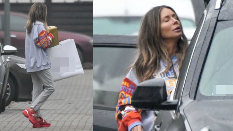 Zaspana Małgorzata Rozenek wędruje do samochodu