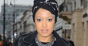 Patricia Kazadi w afrykańskim turbanie na spotkaniu z pisarzem, Andrew Matthewsem