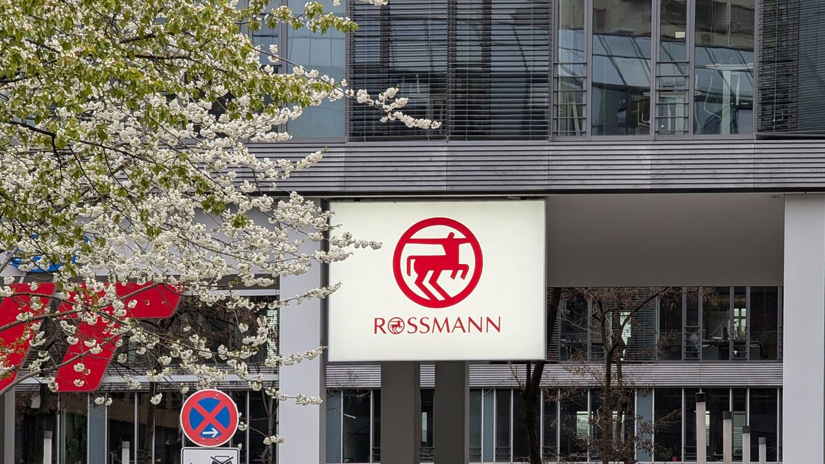 A Rossmann drugstore logo is displayed on a commercial building in Munich, Bavaria, Germany, on April 14, 2026. Dirk Rossmann GmbH, commonly referred to as Rossmann, is one of the largest drugstore chains in Europe. (Photo by Michael Nguyen/NurPhoto via Getty Images)