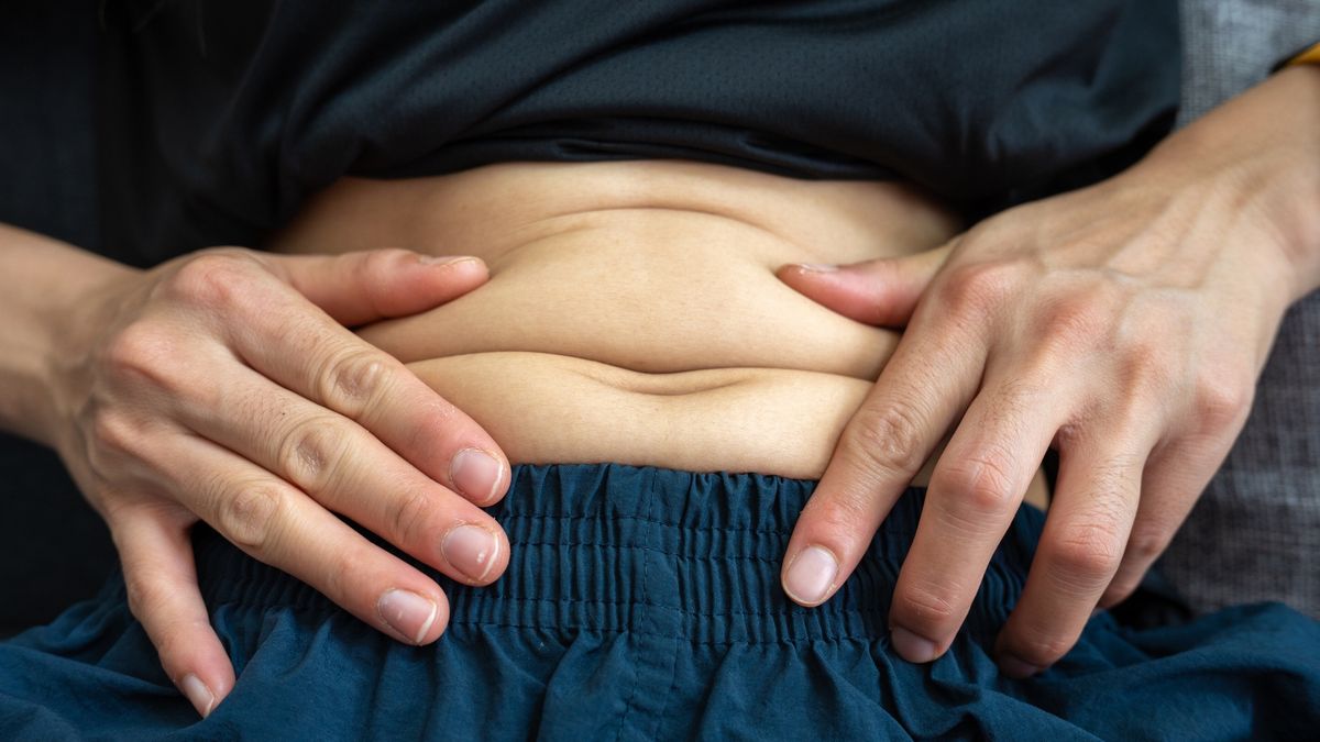 Close up of unidentified person touching fat belly.
Being overweight is one of the leading causes of major diseases such as heart disease, stroke, high blood pressure.
Boy_Anupong