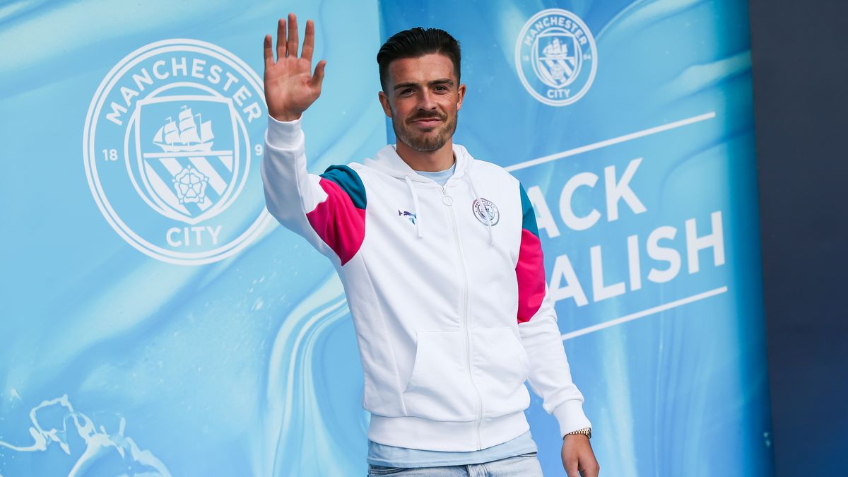MANCHESTER, ENGLAND - AUGUST 09: Jack Grealish of Manchester City waves to the crowd during the Jack Grealish Welcome Show at Manchester City Football Academy on August 9, 2021 in Manchester, England. (Photo by Manchester City FC/Manchester City FC via Getty Images)