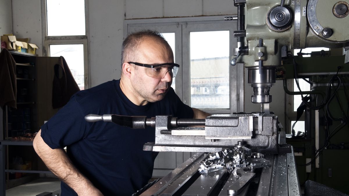 A man operating a metal machine
machinist lathe in the production shop
1905HKN
Real People, Operator, Photography, Males, Engineering, Lathe, Bib Overalls, Adult, Manufacturing, Working, Caucasian Ethnicity, One Person, Concentration, Metal, Dirty, Industry, Technology, Indoors, Human Hand, Engineer, Occupation, People, Flooring, Workshop, Factory, Work Tool, Equipment, Engine, Machinist, Machinery