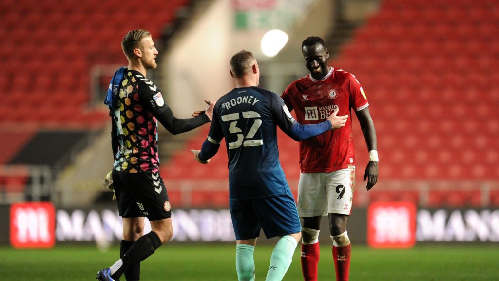 Famara Diedhiou i Wayne Rooney 