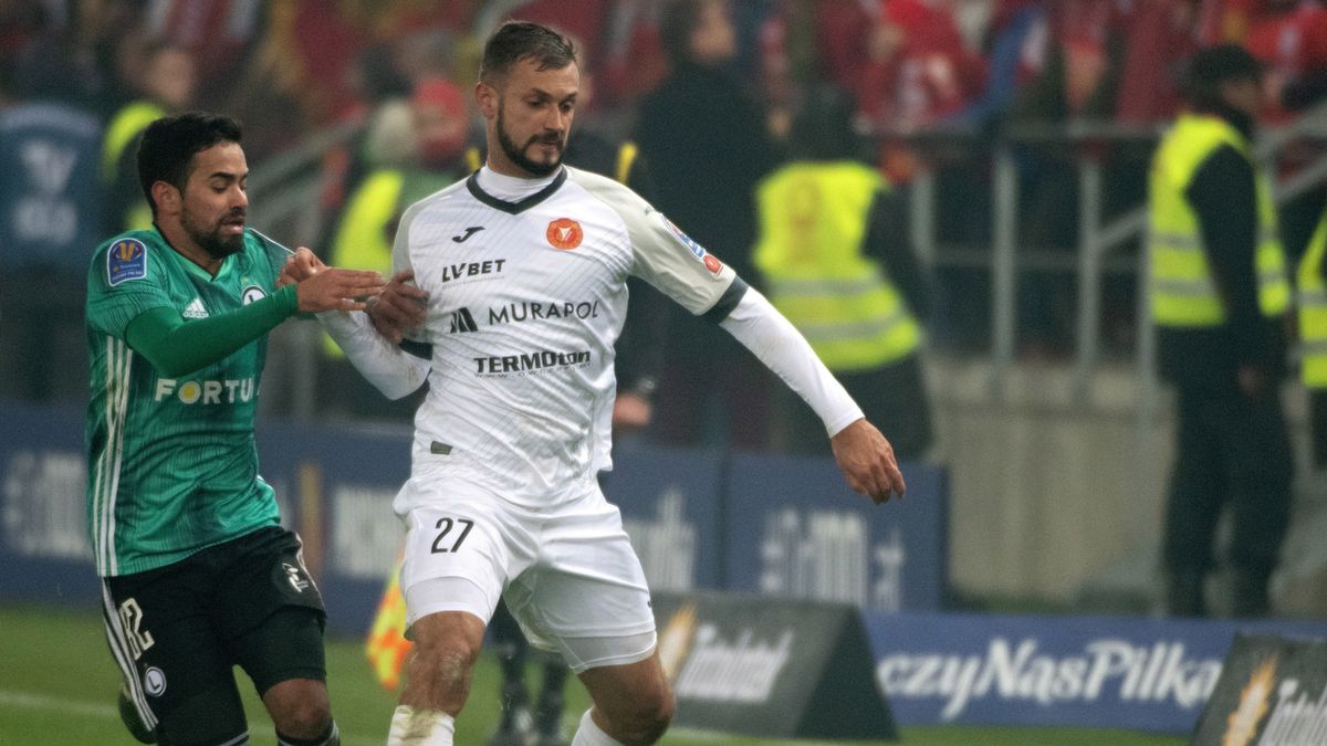 PAP / Grzegorz Michałowski / Na zdjęciu: Daniel Tanżyna (z prawej) w walce z Luquinhasem (z lewej)