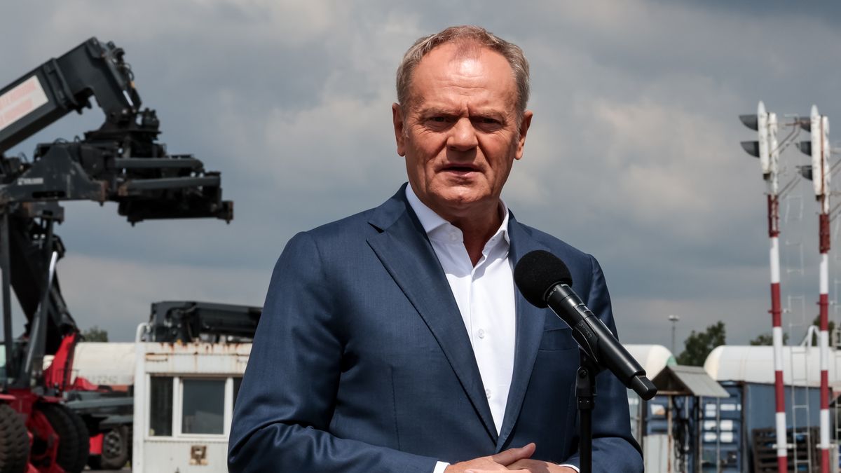 Prime Minister of Poland, Donald Tuskspeaks to press in Euroterminal Slawkow that provides train transport with Ukraine and Asia in Slawkow, Silesian voivodeship, Poland on May 26, 2025. Train transport with the East of Europe, including Ukraine and with Asia pose difficulties as Eastern countries have different width of train tracks. Euroterminal Slawkow is one of a few logistic hubs that can provide load transport onto Eastern size tracks. Poland aims to invest in the hub. (Photo by Dominika Zarzycka/NurPhoto via Getty Images)