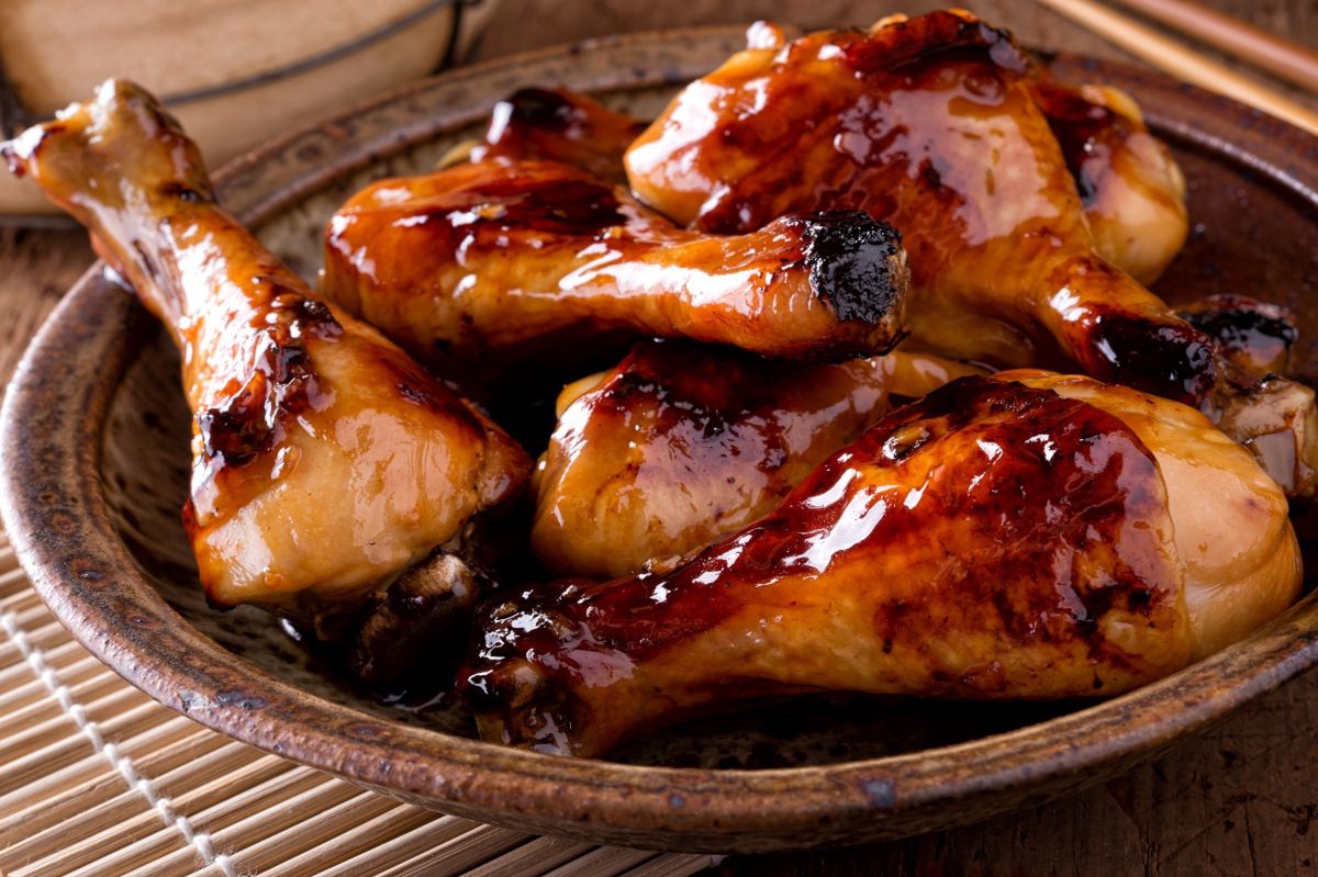 Delicious family dinner: Baked chicken drumsticks in tomato marinade