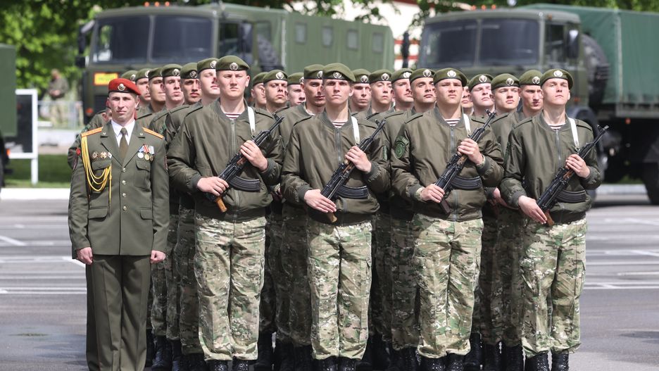 MINSK, BELARUS - MAY 28: In the 3rd separate special purpose brigade, a solemn ceremony is held to take the oath by the soldiers of the military unit in Minsk, Belarus on May 28, 2022. The oath of allegiance to the Motherland was given today by more than two hundred soldiers of the new replenishment. Before that, young soldiers had passed the training course of a young fighter. Several hundred relatives and friends gathered for the holiday, they watched the oath ceremony take place. People from all over Belarus came to the holiday. After the oath, all the soldiers were released on leave until Sunday evening at home to their parents. Discipline among soldiers is very strict. Morale among the soldiers in this brigade is very high. Most of them have recently graduated from school. The young men in this brigade are highly motivated for the defense of Belarus. (Photo by Stringer/Anadolu Agency via Getty Images)