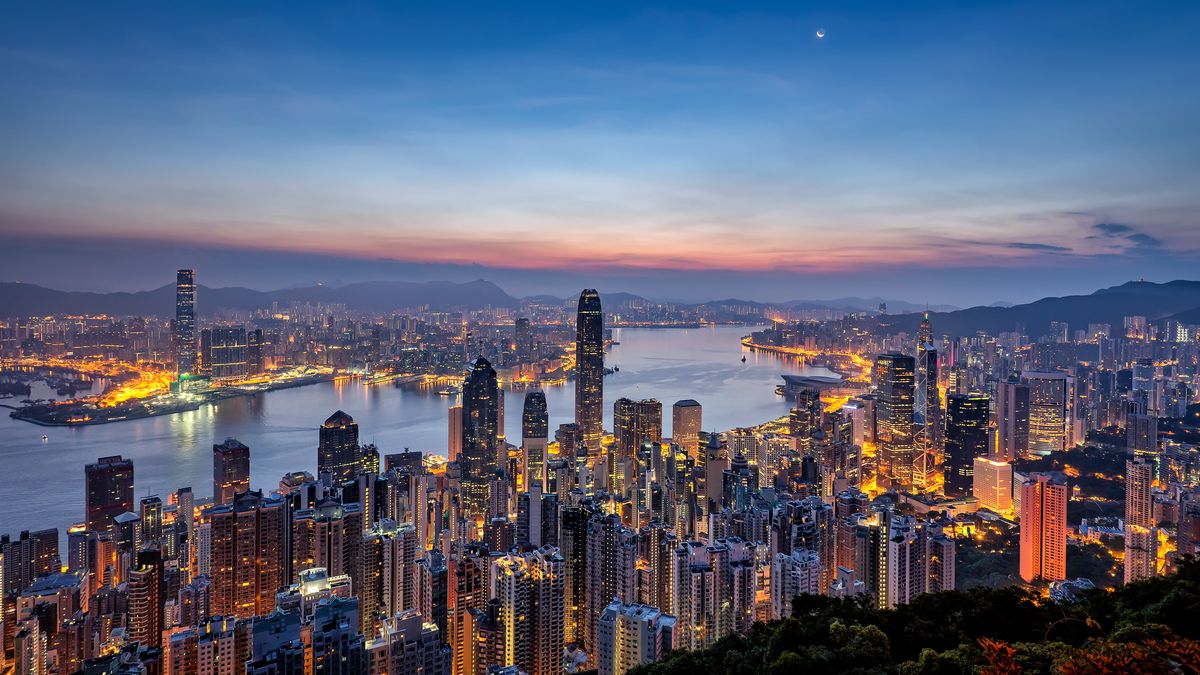 view at the peak observation point of hong kong city and building in the morning sunriseImpossiAble