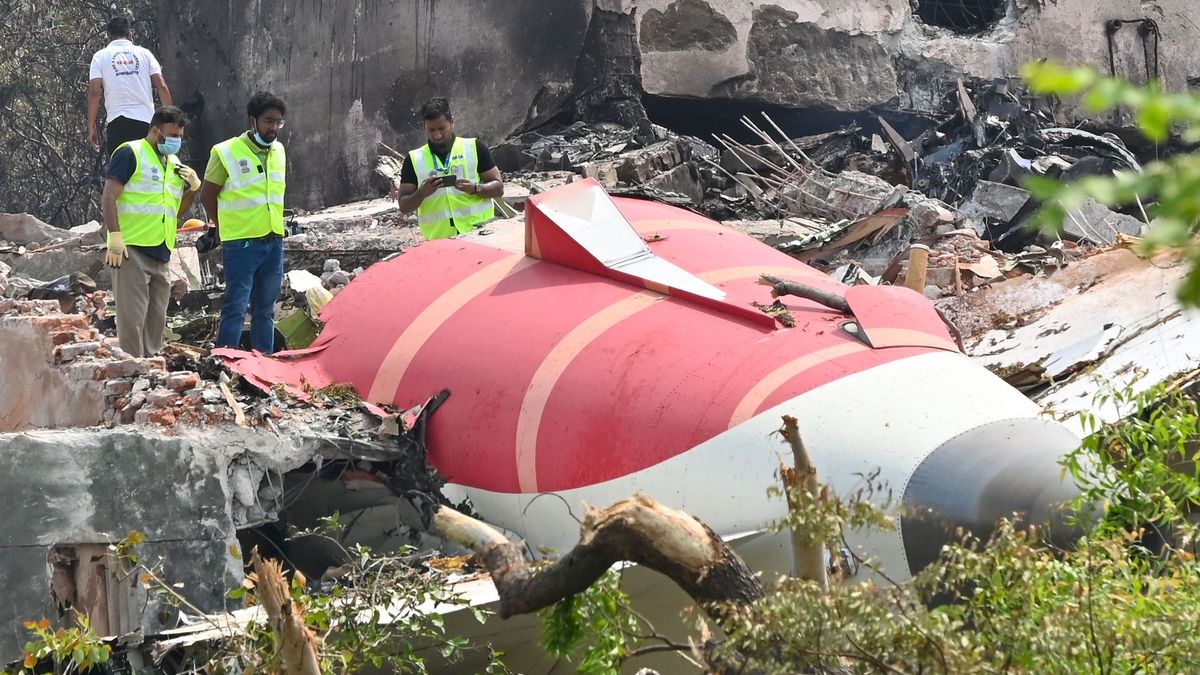 AHMEDABAD, INDIA - JUNE 13: Senior Gujarat government and DGCA officials inspect wreckage of crashed Air India Plane at BJ Medical College hostel on June 13, 2025 in Ahmedabad, India. A London bound Air India Boeing 787-8 Dreamliner crashed minutes after taking off from Ahmedabad's Sardar Vallabhbhai Patel International Airport. Only one out of killing 242 people on board survived. The plane crashed into the residential quarters of doctors of the BJ Medical College. (Photo by Raju Shinde/Hindustan Times via Getty Images)