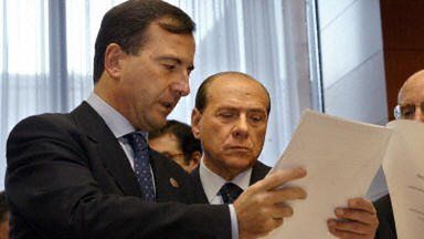Premier Włoch Silvio Berlusconi i szef dyplomacji włoskiej Franco Frattini
