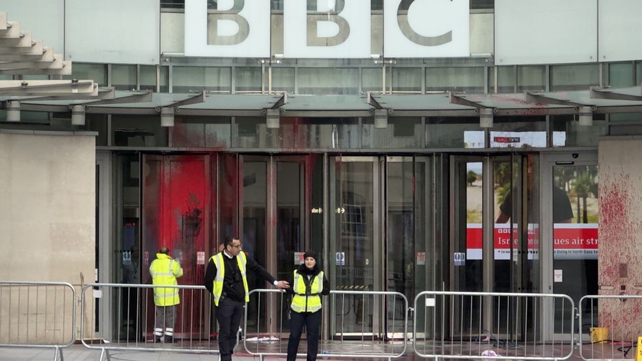 LONDON, ENGLAND - OCTOBER 14: Security forces stand guard as red paint is seen at the entrance to the BBC building in London while supporters of Palestine stage a protest to condemn the Israeli airstrikes in Gaza on October 14, 2023 in London, United Kingdom. (Photo by Muhammed Yaylali/Anadolu via Getty Images)