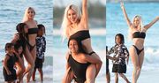 Kim Kardashian szaleje na plaży z gromadką pociech i wskakuje North na barana... (ZDJĘCIA)