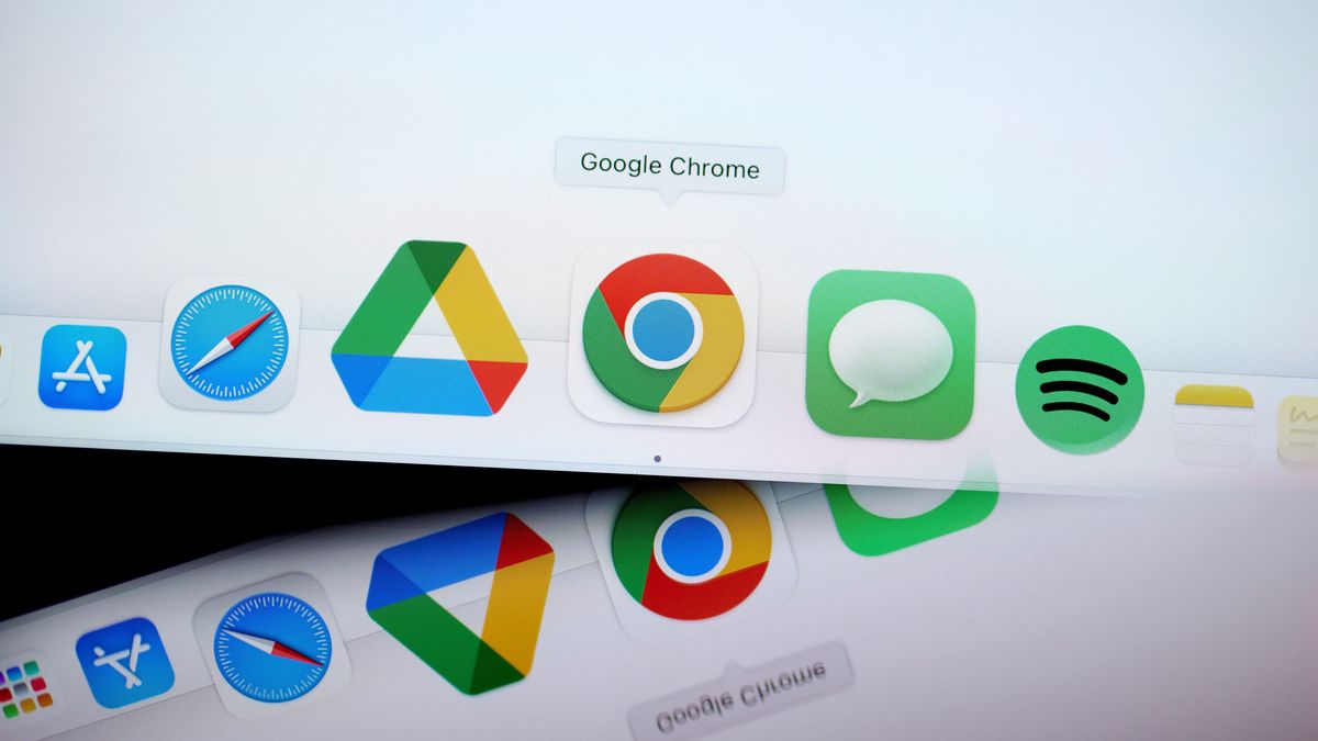 The Google Chrome application, center, on a laptop computer arranged in the Queens borough of New York, US, on Monday, Nov. 18, 2024. Top Justice Department antitrust officials have decided to ask a judge to force Alphabet Inc.'s Google to sell off its Chrome browser in what would be a historic crackdown on one of the biggest tech companies in the world. Photographer: Gabby Jones/Bloomberg via Getty Images
