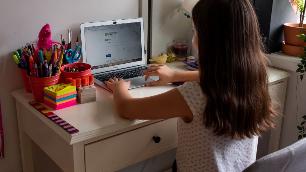 Re-opening Continues Across Densely Populated New York And New Jersey Areas
NEW YORK, NEW YORK - SEPTEMBER 27: A kid sits in front of her computer as she does homeschooling at her home as the city continues Phase 4 of re-opening following restrictions imposed to slow the spread of coronavirus on September 27, 2020 in New York City. The fourth phase allows outdoor arts and entertainment, sporting events without fans and media production. (Photo by Noam Galai/Getty Images)
Noam Galai
pandemic, re-opening, nyc, homeschool, school, remote, remote learning