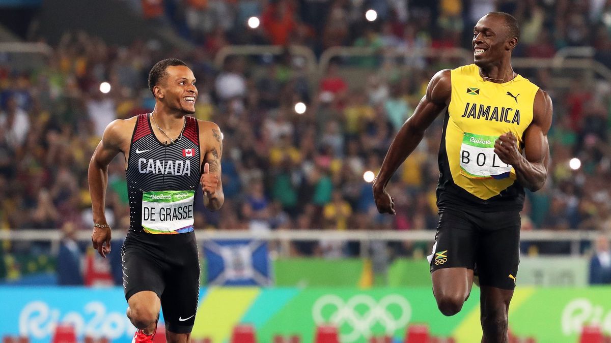 Usain Bolt i Andre De Grasse podczas półfinału biegu na 200 m na igrzyskach w Rio de Janeiro 2016