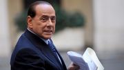 Premier Włoch, Silvio Berlusconi.