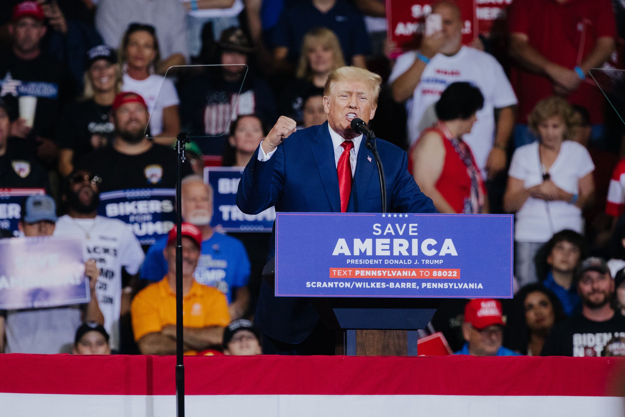 Former US President Donald Trump gestures as he speaks during a rally in Wilkes-Barre, Pennsylvania, US, on Saturday, Sept. 3, 2022. Trump used a Pennsylvania rally to vent his anger at an FBI search of his Florida home and President Joe Bidens attack on political extremism, staking his claim as his successors election rival in 2024. Photographer: Michelle Gustafson/Bloomberg via Getty Images