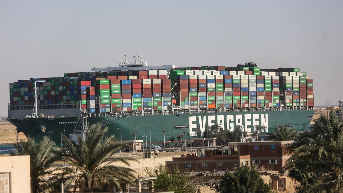 The Ever Given container ship moves along the Suez Canal towards Ismailia after being freed from the canal bank in Suez, Egypt, on Monday, March 29, 2021. The giant Ever Given container ship was finally pulled free from the bank of the Suez Canal, allowing for a massive tail back of ships to start navigating once again through one of the worlds most important trade routes. Photographer: Islam Safwat/Bloomberg via Getty Images