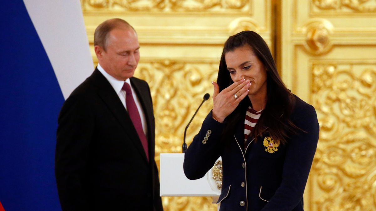Władimir Putin (L) i Jelena Isinbajewa (P)