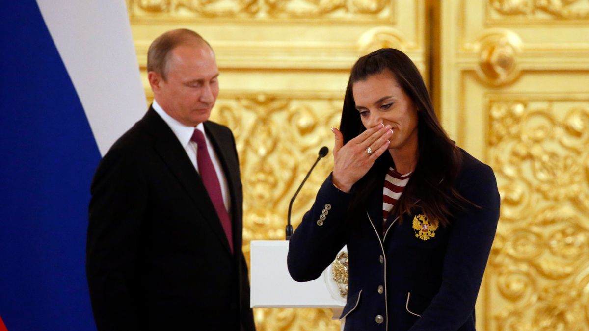 Getty Images / Na zdjęciu: Władimir Putin (L) i Jelena Isinbajewa (P)