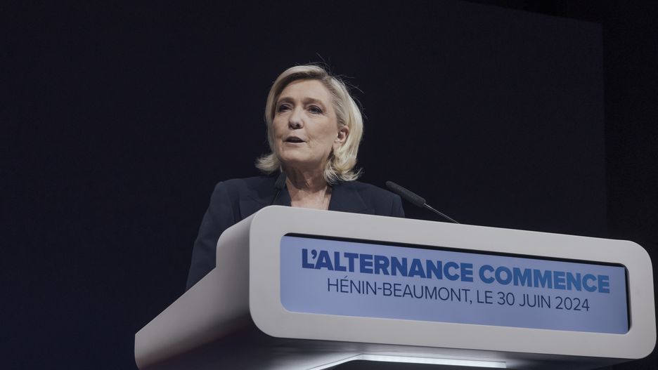 Marine Le Pen, leader of National Rally, speaks at the party headquarters following voting during the first round of legislative elections in Henin-Beaumont, France, on Sunday, June 30, 2024. Le Pen's National Rally was on track to dominate the first round of France's legislative election, dealing a major blow to President Emmanuel Macron and setting the stage for a far-right party to control the country's government for the first time in its modern history. Photographer: Cyril Marcilhacy/Bloomberg via Getty Images