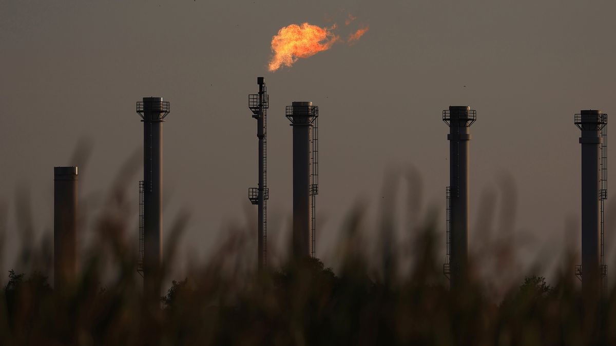 A flare stack burns at the natural gas storage facility operated by Astora GmbH & Co KG, one of the largest in Western Europe and formerly controlled by Gazprom Germania GmbH, in Rehden, Germany, on Tuesday, Aug. 23, 2022. The former Gazprom unit, now named SEFE Securing Energy for Europe GmbH, and Uniper SE -- both the recipients of German government bailouts -- are seeking 92% of the relief from a levy to share the burden of higher gas prices with consumers, according to a person familiar with the situation. Photographer: Krisztian Bocsi/Bloomberg via Getty Images
