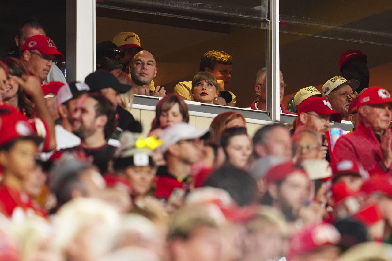 KANSAS CITY, MO - OCTOBER 07:  Taylor Swift looks on from the stands during an NFL football game between the New Orleans Saints and the Kansas City Chiefs at GEHA Field at Arrowhead Stadium on October 7, 2024 in Kansas City, Missouri. (Photo by Cooper Neill/Getty Images)