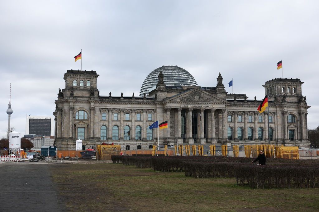 German Federal Election
A view of the Reichstag building during the German federal election in Berlin, Germany on February 23, 2025. (Photo by Jakub Porzycki/NurPhoto via Getty Images)
NurPhoto
legislative building, voter turnout, flags, election day, landmark, political representation, federal government, jakub porzycki, german democracy., entrance, election results, democratic process, political event, political landscape, national election, parliament, building, german federal election, parliamentary, nurphoto, elections, february 23, german parliament, political candidates, reichstag building, european politics, civic engagement, electoral system, political process, political parties, federal, german