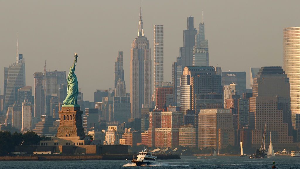 Sunset in New York City
BAYONNE, NJ - JULY 28: The sun sets on the Statue of Liberty and the Empire State Building in New York City on July 28, 2025, as seen from Bayonne, New Jersey.  (Photo by Gary Hershorn/Getty Images)
Gary Hershorn