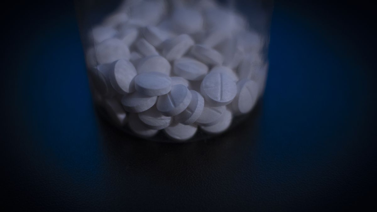 A plastic bottle with white coloured antidepressant pills on a desktop is seen in this illustration photo in Warsaw, Poland on 25 April, 2024. (Photo by Jaap Arriens/NurPhoto via Getty Images)