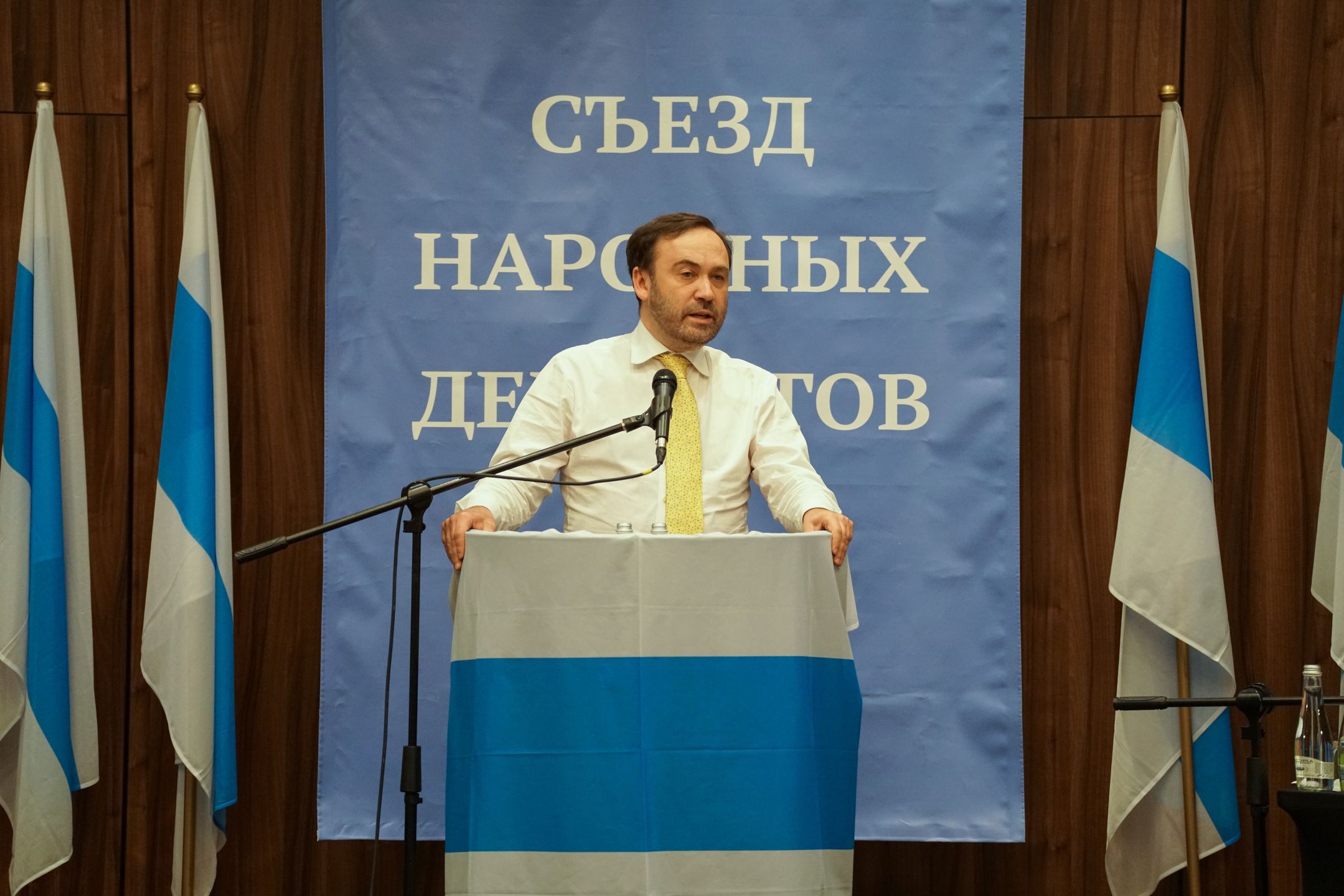 Russian Parliament In Exile Debate Post-Putin Russia in Warsaw CongressWARSAW, POLAND - JUNE 11: Russian-Ukrainian politician Ilya Ponomarev speaks at the Congress of People's Deputies, a self-proclaimed Russian parliament in exile, as Russian opposition members gather in the Airport Hotel Okecieto to work and vote on the new Russian constitution on June 11 2023 in Warsaw, Poland. (Photo by Magdalena Chodownik/Getty Images)Magdalena Chodownik