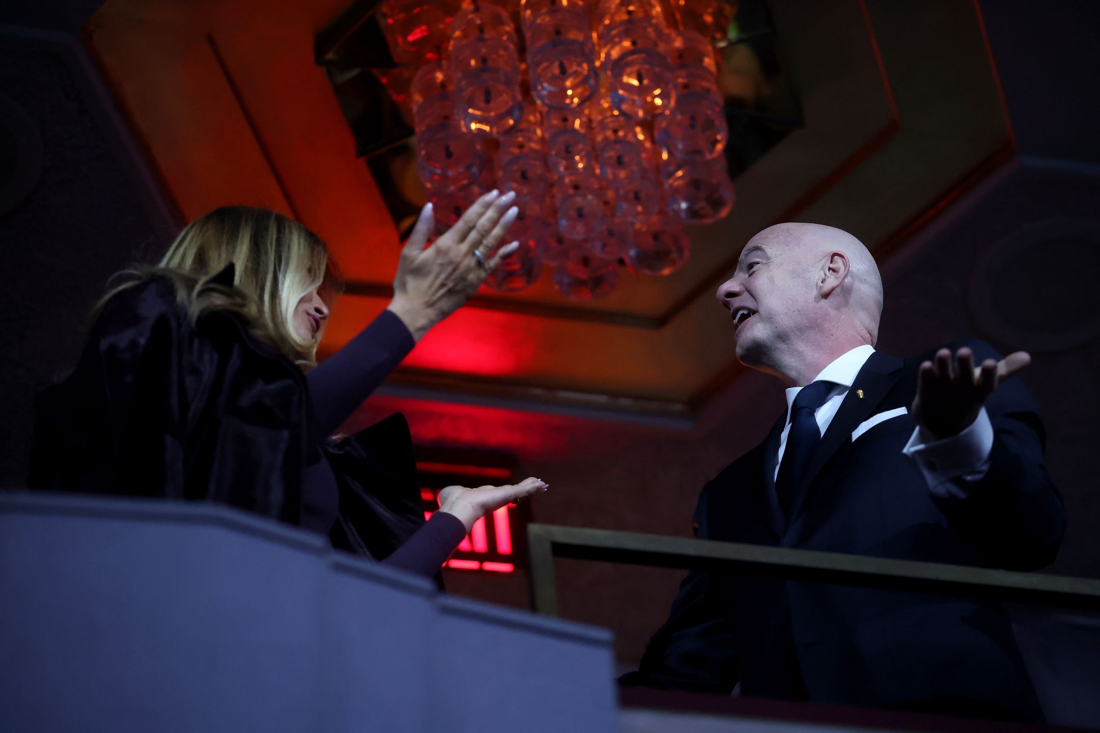 WASHINGTON, DC - DECEMBER 05: U.S. First Lady Melania Trump and Gianni Infantino, President of FIFA, react during the FIFA World Cup 2026 Official Draw at John F. Kennedy Center for the Performing Arts on December 05, 2025 in Washington, DC. (Photo by Hector Vivas - FIFA/FIFA via Getty Images)