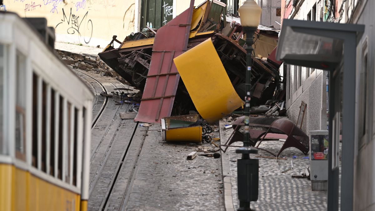 LISBON, PORTUGAL - SEPTEMBER 04: Rescuers and firefighters operate at the scene after the Gloria funicular cable railway derailed in Lisbon, Portugal, 04 September 2025. At least 17 died in the derailment, with emergency services reporting that 20 were injured and others are still trapped at the scene. (Photo by Zed Jameson/Anadolu via Getty Images)